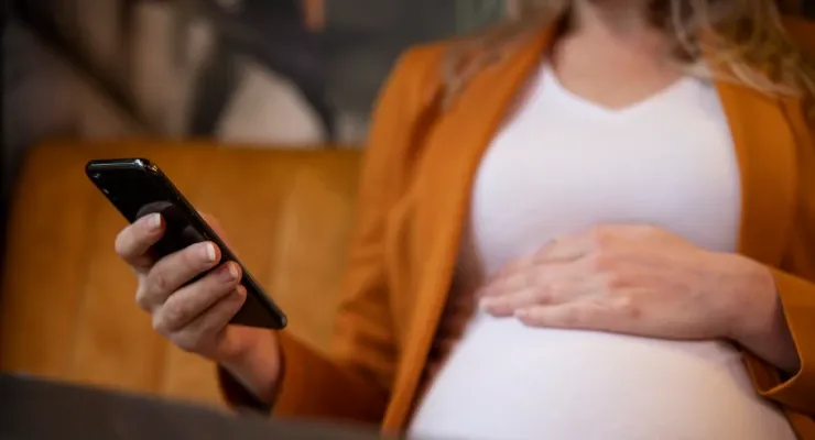 Pregnant woman calling her doctor at night